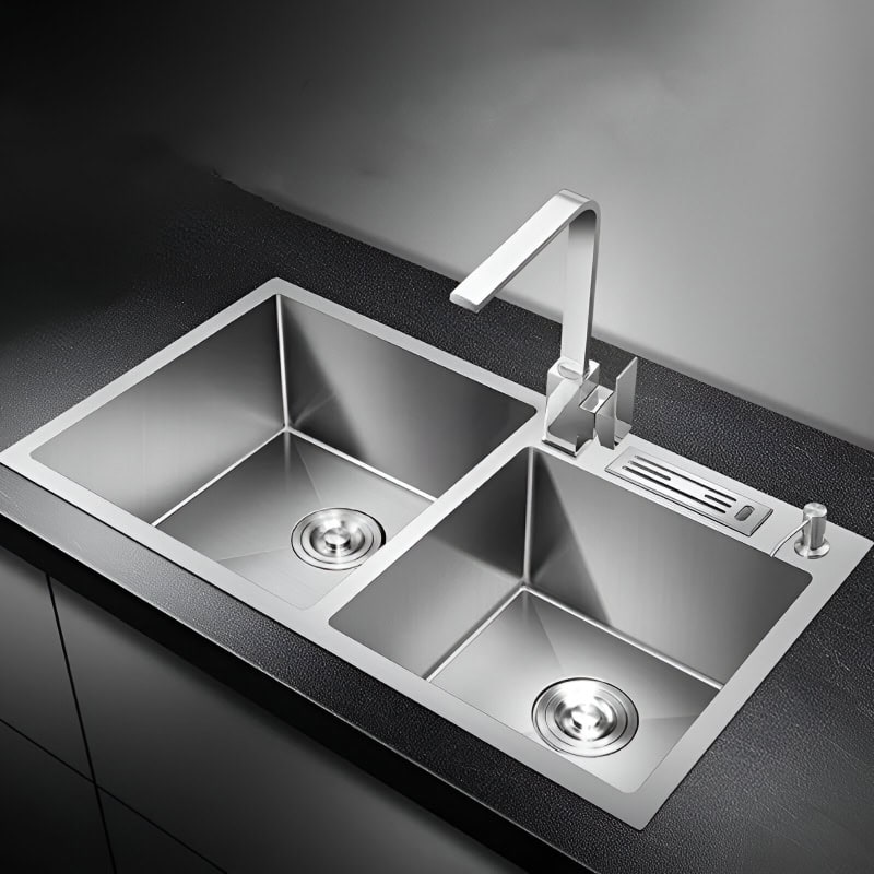 Stainless steel kitchen sink with dual basins and modern faucet, ideal for contemporary kitchens, durable, corrosion-resistant, and easy to clean. Perfect for food prep and dishwashing.