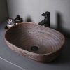 Elegant wooden vessel sink ideal for modern bathroom decor, crafted from natural wood, combines aesthetics and durability, perfect for luxury home renovations or professional spa settings.
