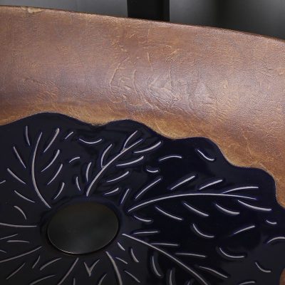 Highly detailed image of a stylish optical display featuring intricate leaf-like cutouts, showcasing premium eyewear presentation at Monalisa Store. Perfect for eye care and optical retail branding.