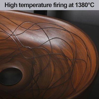 Optical glass sink with intricate black inlay design, fired at 1380°C for durability and style.