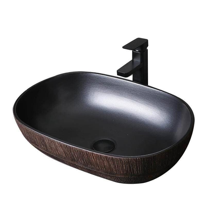 Modern black oval bathroom sink with a sleek design and wooden-textured exterior, perfect for contemporary bathroom decor. Includes a matte black faucet for a stylish, functional upgrade.