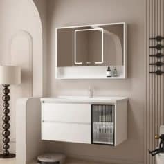 Stylish modern bathroom vanity with mirror, sleek white cabinetry, and a glass-front storage compartment, perfect for elegant bathroom decor.
