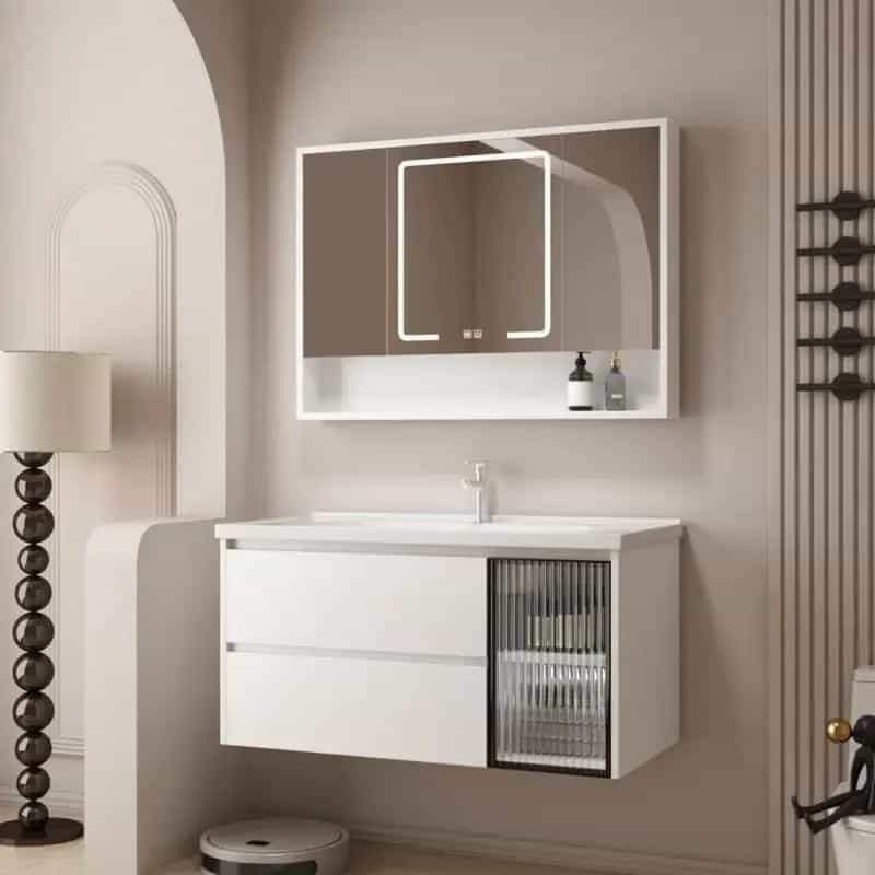 Stylish modern bathroom vanity with mirror, sleek white cabinetry, and a glass-front storage compartment, perfect for elegant bathroom decor.