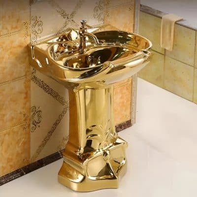 Luxurious gold finish washbasin with classic design, ideal for spa, beauty clinics, and medical facilities. Durable and stylish sink for enhancing luxury environments.