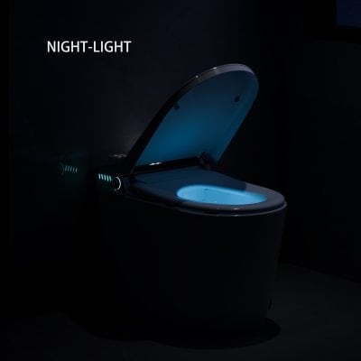 A high-tech smart toilet seat with built-in night light for improved hygiene and convenience during nighttime bathroom visits. Perfect for modern bathrooms seeking comfort and functionality.