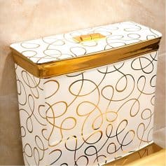 Luxurious white and gold decorative storage with intricate swirl pattern, perfect for optometry clinics or eyewear boutiques.