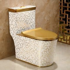Luxury Monalisa medical toilet with gold-tone lid and decorative patterned cover for upscale opt clinic bathrooms.