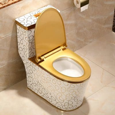 Stylish gold toilet seat with white and gold design, ideal for upscale bathrooms. Comfortable and elegant, perfect for modern kitchen and home decor.