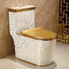 Luxurious gold toilet with stylish swirl pattern, ideal for high-end modern bathrooms and interior design.