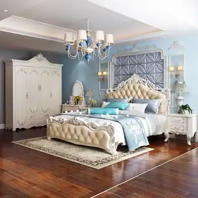 Luxurious classic bedroom furniture with ornate bed, wardrobe, and nightstands in cream and blue tones, perfect for a sophisticated bedroom interior.