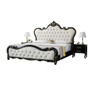 Luxurious king-size bed with ornate black and gold accents, infused with classic European design, perfect for upscale bedrooms seeking sophistication and comfort.