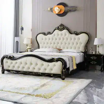 Luxurious bedroom furniture featuring a classic tufted headboard with black and gold accents, complemented by matching nightstands, perfect for a sophisticated bedroom decor.