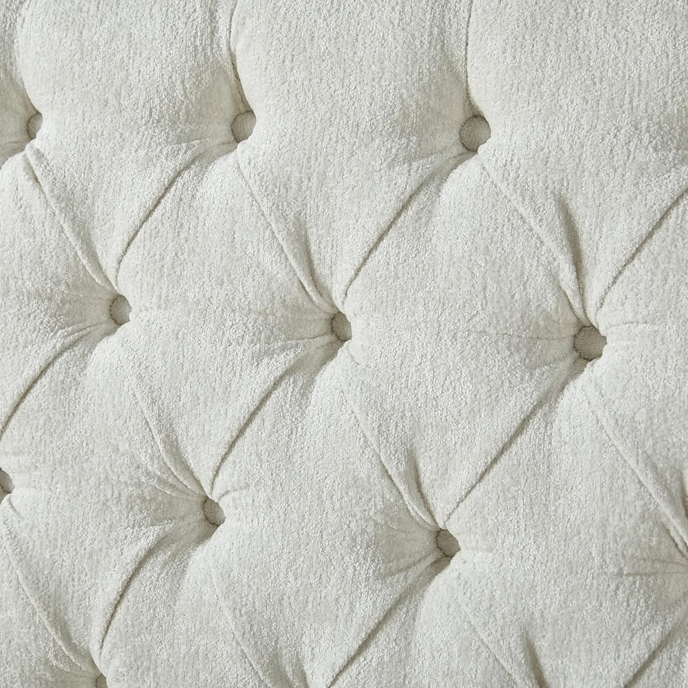 Luxurious white tufted headboard with button accents, ideal for modern bedroom decor, made from soft fabric, providing elegance and comfort.