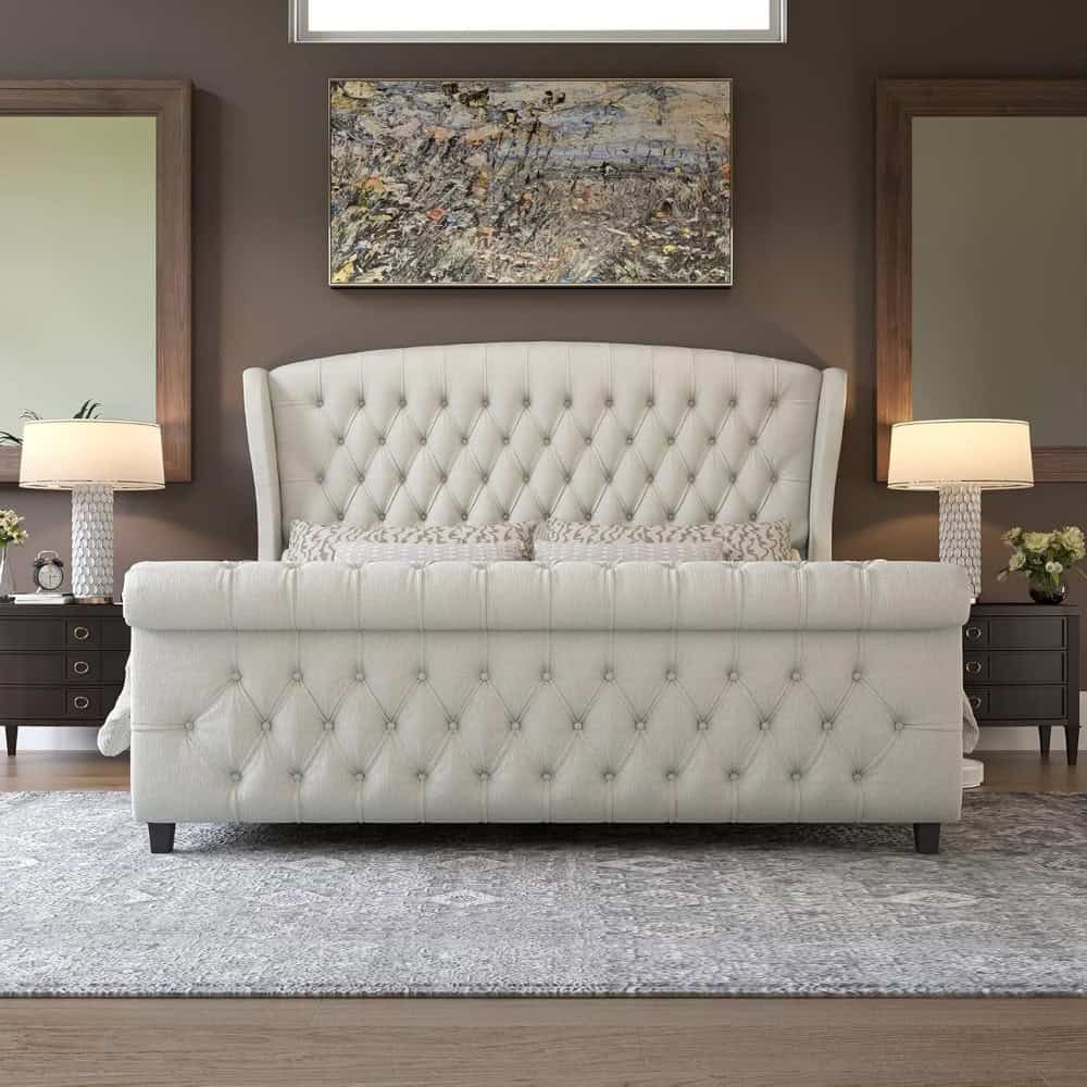 Luxury bedroom with elegant white tufted bed, modern nightstands, stylish lamps, and contemporary artwork, creating a sophisticated and comfortable space.