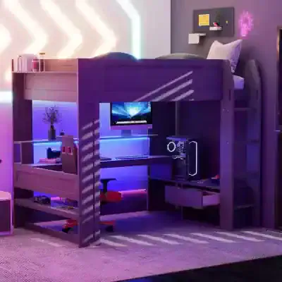 Bright purple loft bed with integrated gaming workspace and LED lighting, ideal for children's or teens' rooms. Features a desk, monitor setup, and storage for accessories.