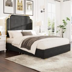 Luxurious black velvet bed with gold trim, cozy white and brown bedding, stylish bedroom decor perfect for a sophisticated sleep space.