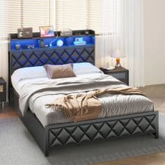 Luxurious bedroom setup featuring a fashionable black leather bed with diamond quilting, matching bedside tables, and a cozy ambiance ideal for restful sleep and modern home aesthetics.