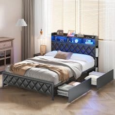 Compact bedroom with a stylish bed, built-in storage drawers, and modern decor. Ideal for enhancing sleeping space with functional furniture solutions.