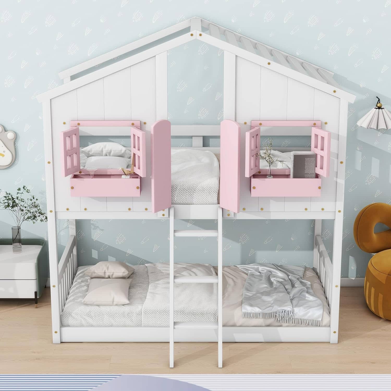 Bright children’s bunk bed featuring a house-shaped frame with pink window shutters, providing a fun and safe sleeping space for kids.