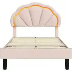 Decorative lemon-shaped upholstered bed headboard for stylish bedroom decor and comfort. Perfect for modern and contemporary bedroom designs.