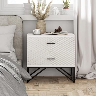 Contemporary white and black bedroom side table with two drawers, stylish handle pulls, and decorative items on top. Perfect for bedroom decoration and bedside storage.