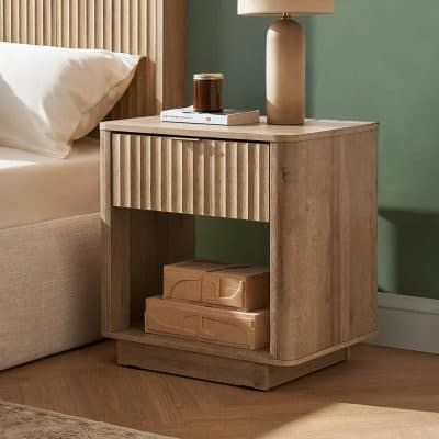Stylish wooden nightstand featuring natural textures, ideal for bedroom furniture and decor. Perfect for adding warmth and elegance to your bedroom setup.