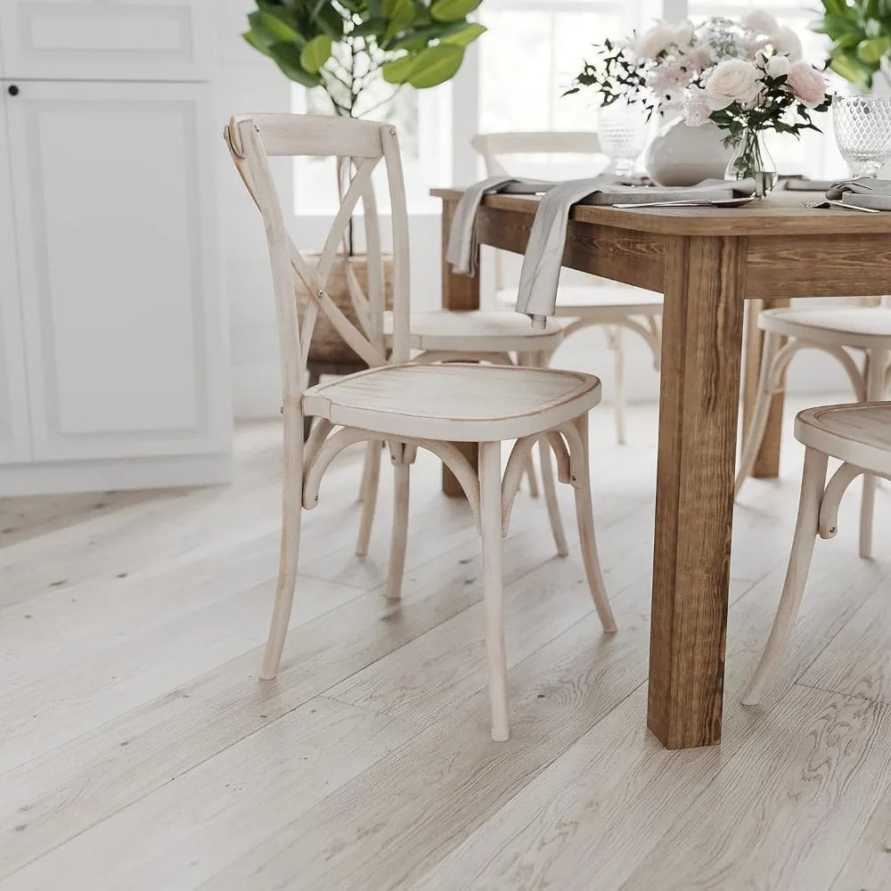 Elegant dining table with white wooden chairs, perfect for home and restaurant decor. Features a natural wood finish, stylish and durable for everyday use, enhancing your dining space.