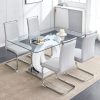 Stylish glass dining table with white leather chairs in a modern minimalist dining room, perfect for contemporary interior design and family gatherings.