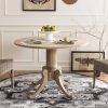 Classic round wooden dining table with sturdy pedestal base, ideal for contemporary and traditional dining spaces. Perfect for family dinners and gatherings.