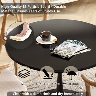 A sleek black round table with a smooth MDF surface, ideal for modern interiors. It is scratch-resistant and waterproof, making it perfect for busy households or cafes. Easy to clean with a damp cloth, this sturdy table provides a stylish and practical dining or workspace solution. Durable and low maintenance, it combines functionality with contemporary design.
