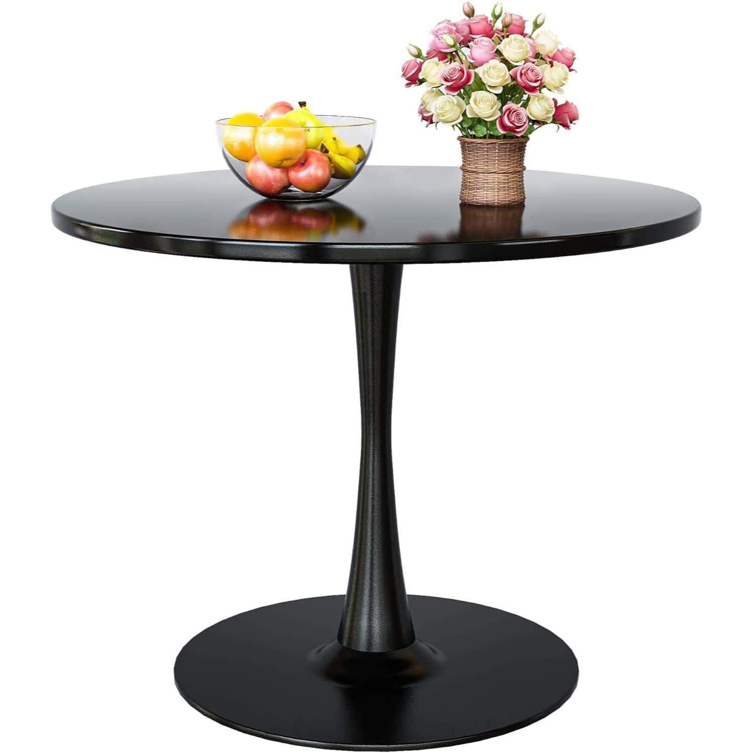 A sleek black round table featuring a glass bowl of colorful fruits and a basket of pink and white roses, perfect for home decor or a cozy cafe setting.
