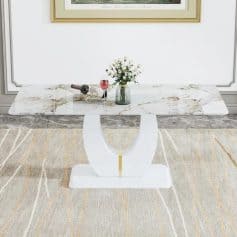 Luxury marble dining table with sleek white base, perfect for contemporary homes. Features a stunning marble surface, ideal for dining rooms, showcasing high-end interior design and sophisticated style.