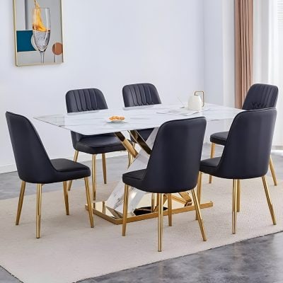 Stylish monochrome dining table with luxurious black chairs and gold details, perfect for contemporary interior design and upscale dining experiences.