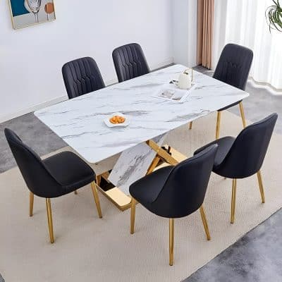 Luxurious marble dining table with six black and gold chairs, ideal for contemporary dining rooms and stylish home interiors.