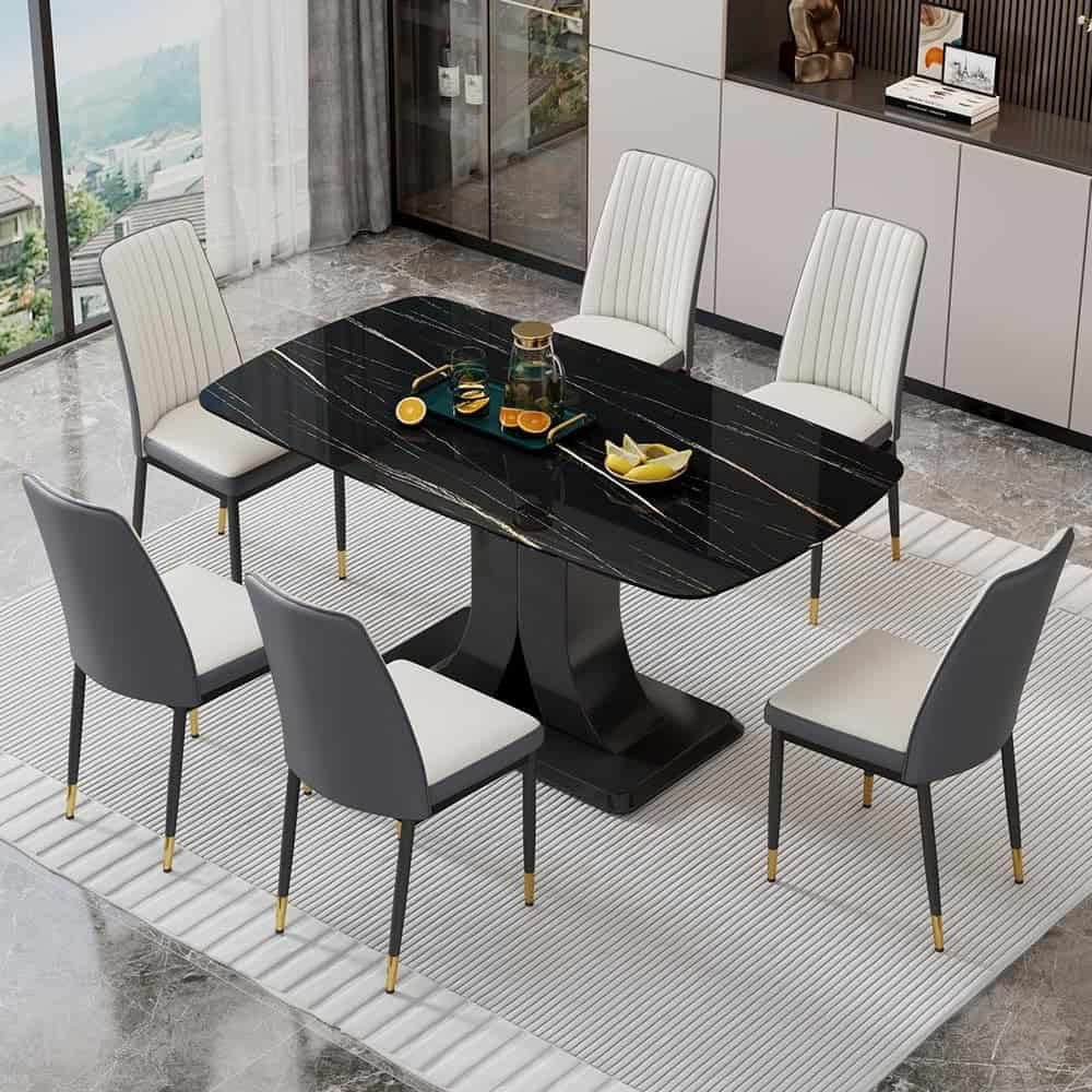 Stylish black marble dining table with six embedded chairs, perfect for contemporary living spaces, featuring sleek design and gold accents.