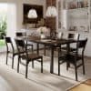 Stylish dining room with a black wooden table, six chairs, and elegant pendant lighting, ideal for entertaining guests. Bright with natural light, decorated with flowers and modern art on the wall.