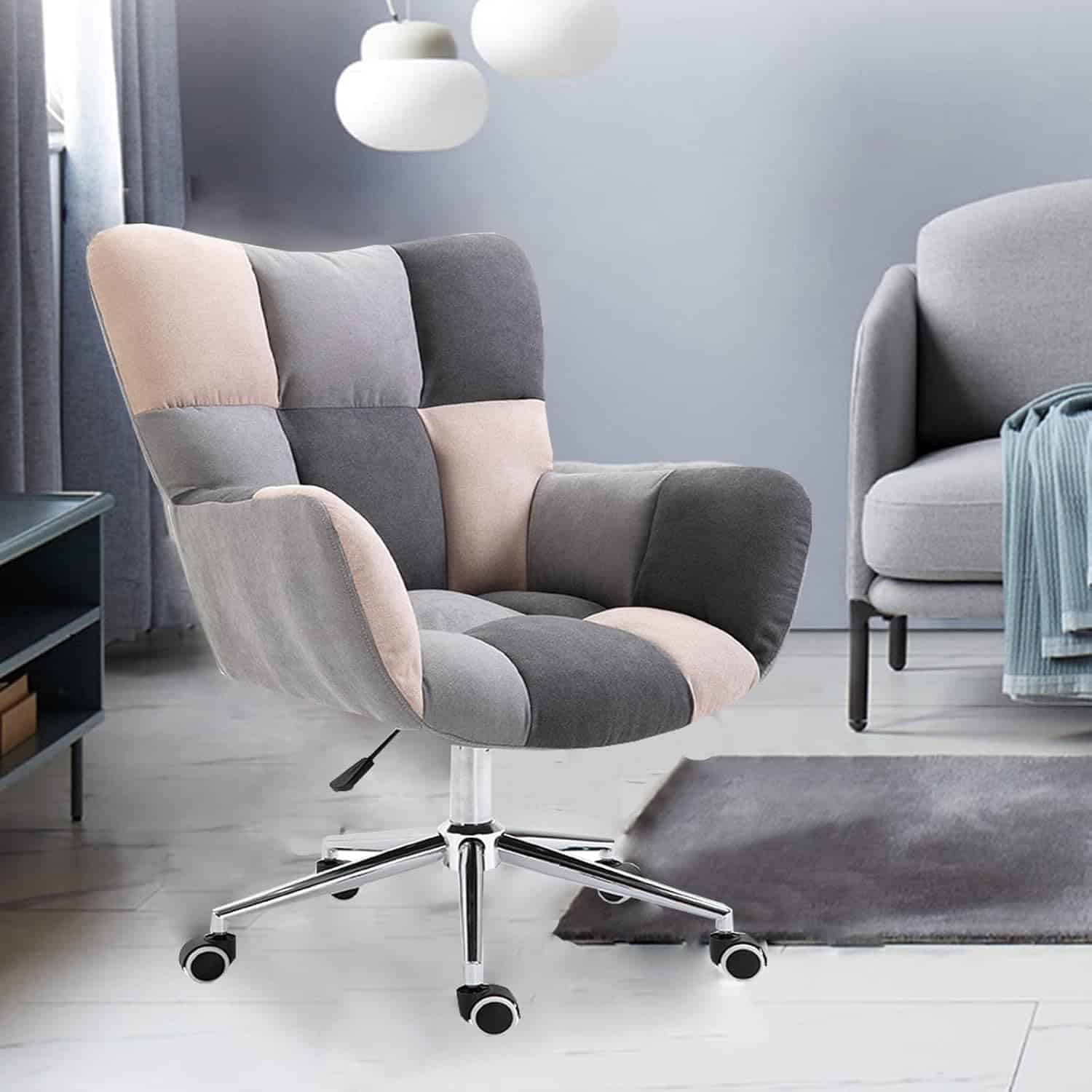 A chic, multi-tone upholstered office chair with a high backrest, swivel base, and caster wheels, perfect for ergonomic work in a modern medical or professional environment.