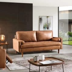 Elegant leather sofa in a contemporary living space, perfect for modern home interiors with sleek design and plush comfort.