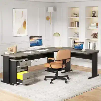 Optometry office desk with dual computers, bookshelves, and stylish décor for eyewear store and eye care professionals. Modern, organized workspace at Monalisa Medical.