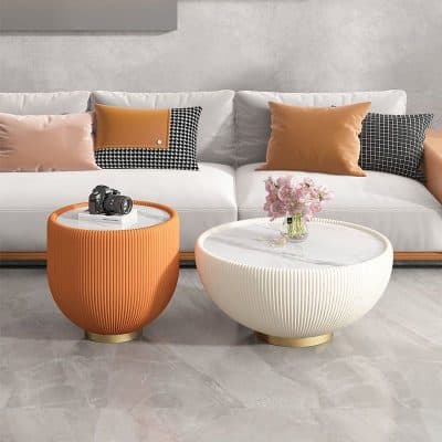 Optimized for eyewear shopping, this stylish living room features modern furniture and decorative pillows, creating a sophisticated ambiance ideal for opticians and optical retail stores.