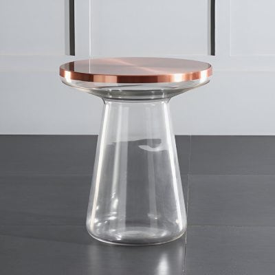 Contemporary glass side table with rose gold rim, ideal for modern homes, adds elegance and style to living rooms and bedrooms.