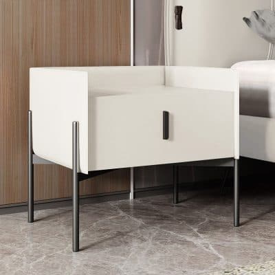 Minimalist white nightstand with storage drawer, black handle, and metal legs for contemporary bedroom decor.