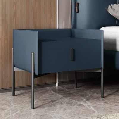 Sleek navy blue bedside table with concealed drawer, sturdy metal legs, ideal for contemporary bedrooms, offers functional storage and modern aesthetic appeal.