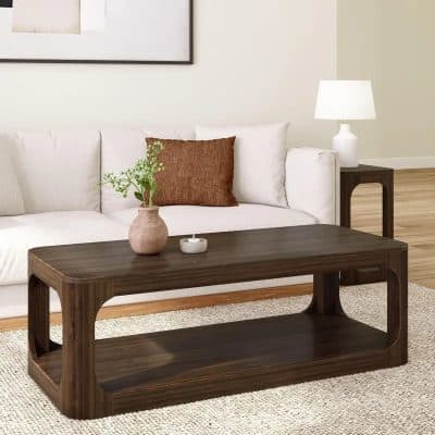 Stylish wooden coffee table with sleek design, perfect for modern living room setups and home decor. Durable material enhances aesthetic appeal and functionality for a cozy seating area.