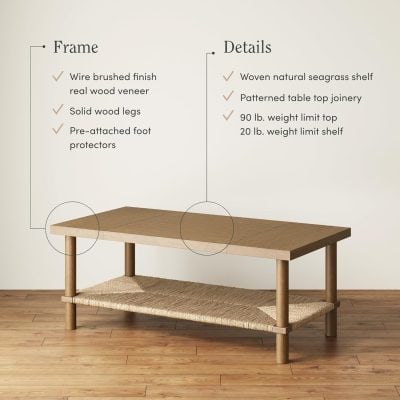 Natural wood coffee table with woven seagrass shelf, sturdy legs, and meticulous craftsmanship, perfect for contemporary living room decor.