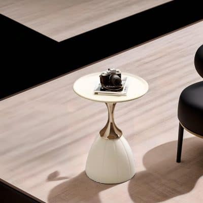 High-quality white and gold side table with sleek design, perfect for ophthalmic displays and retail eyewear stores like Monalisa Medical.
