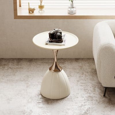 Stylish optical store table featuring a camera and magazines, perfect for showcasing eyewear and accessories in an optometry or eyewear retail environment.