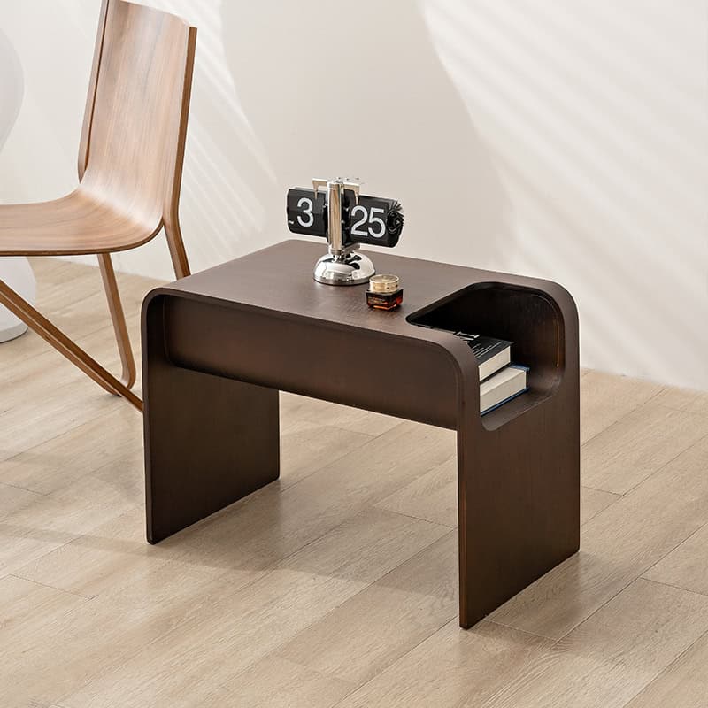 Elegant dark wood side table for living room or office, featuring a flip calendar, books, and a minimalist design for sophisticated interior decor and functional use.