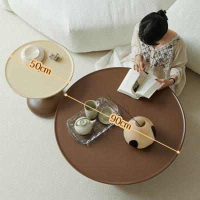 Aesthetic eye care accessories and decor at Monalisa Store, featuring a brown and beige table setup with decorative objects, emphasizing a stylish and inviting atmosphere for optical accessories shopping.