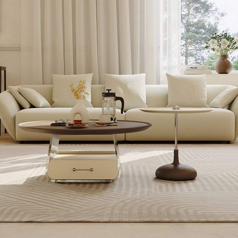 Luxurious living room featuring contemporary furniture, plush pillows, and natural sunlight creating a cozy and stylish atmosphere in a modern home.